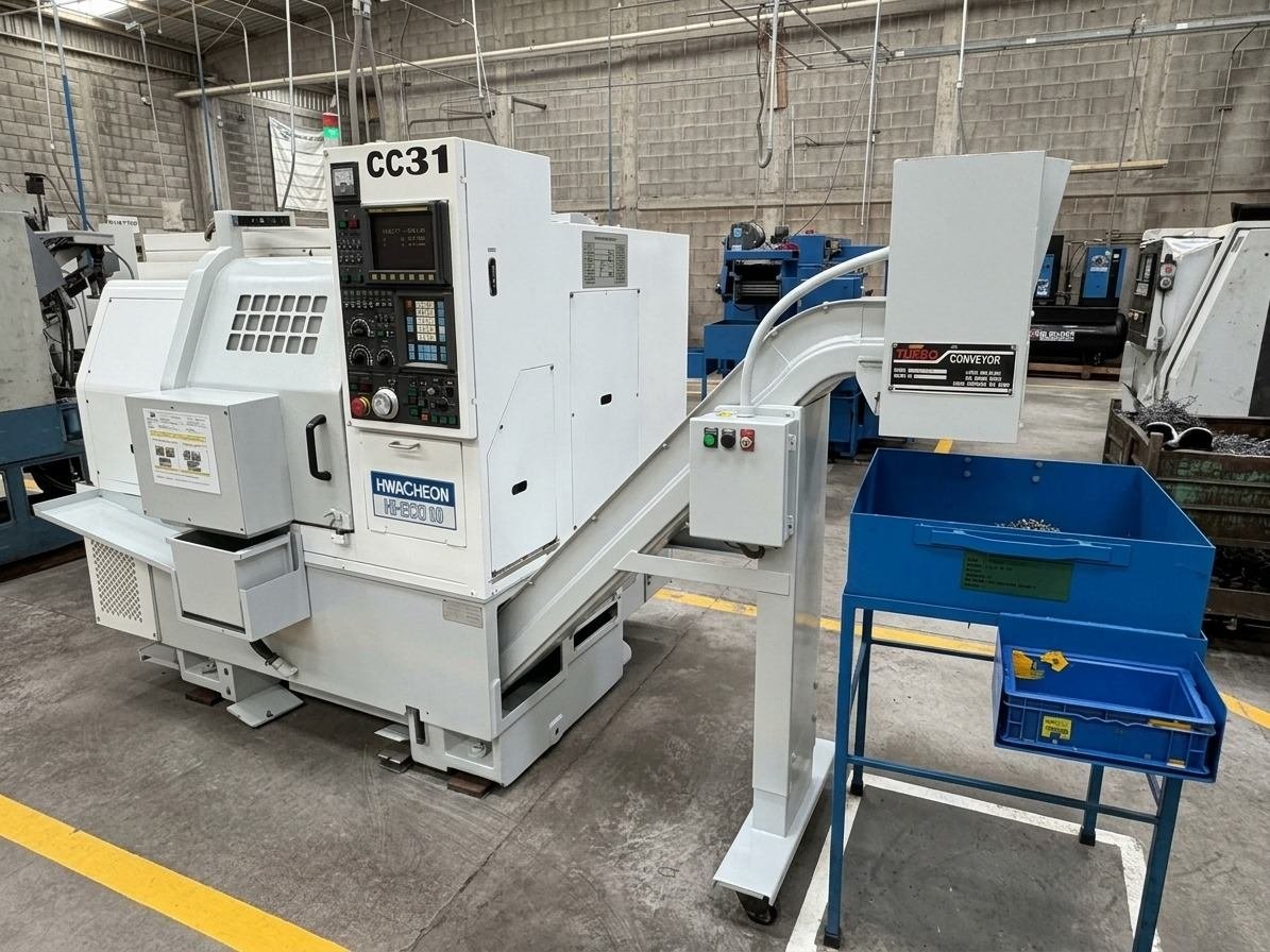 Torno CNC Hwacheon con transportador de viruta